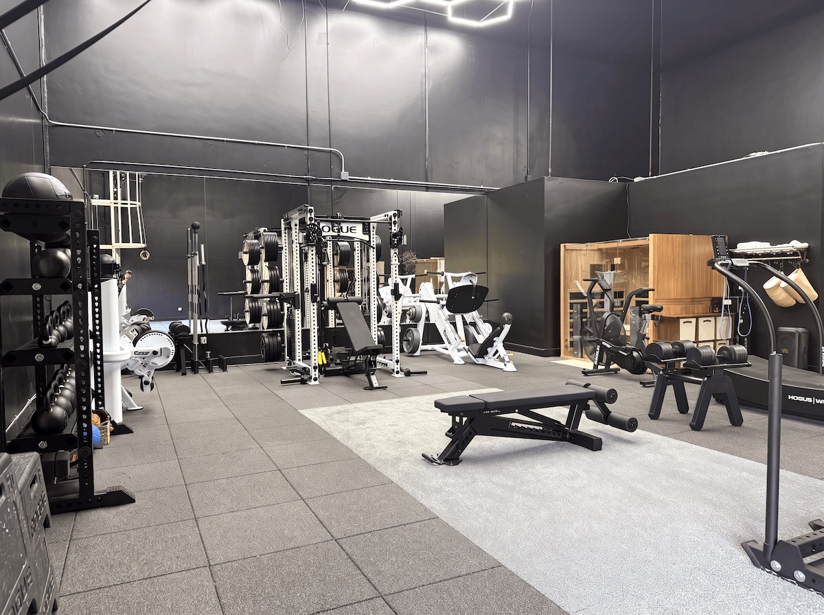 Strength area with power rack, Hoist leg press, benches, and infrared sauna